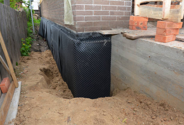 Happy homeowners after waterproofing job in Rapidan